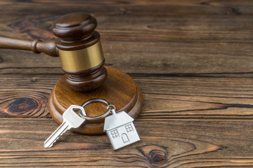 House keys and judge gavel. Concept purchase sale, rent, auction, mortgage. The arrest of property,...