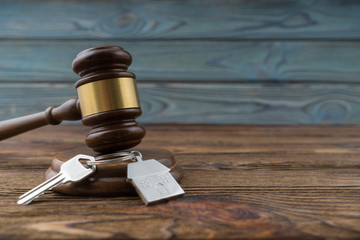 House keys and judge gavel. Concept purchase sale, rent, auction, mortgage. The arrest of property,...