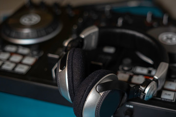 Fototapeta na wymiar Headphone and sound audio controller music mixer dj pult