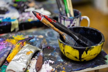 Colorful paint brushes Art concept. Painting process