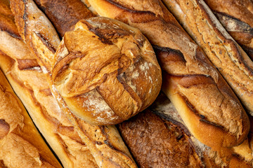 French baguettes. Fresh crisp bread. Bread background.