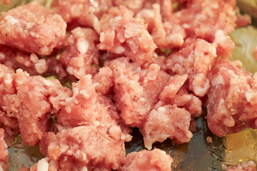 Cooking chicken mince in pot 