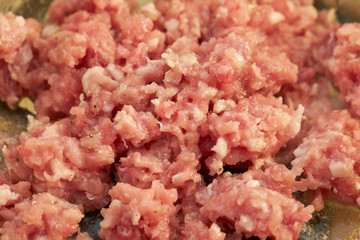 Cooking chicken mince in pot 