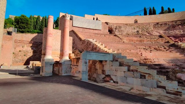 Close up, medium dolly shot reveal stage at amphitheater, Cartagena, Spain