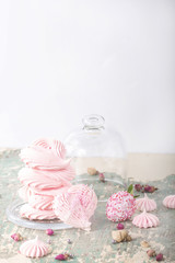 Yogurt glazed strawberries and heart shaped meringues