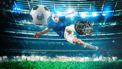 Soccer striker hits the ball with an acrobatic kick in the air at the stadium