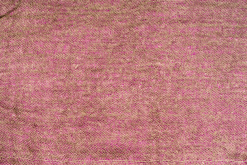 Background in the form of pale pink crumpled fabric