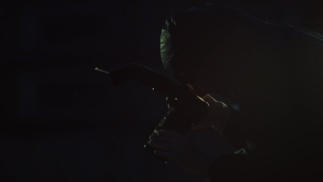 Criminalist taking photos to prove murder, night dark shot