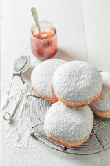 Fototapeta na wymiar Top down view of donuts with powdered sugar