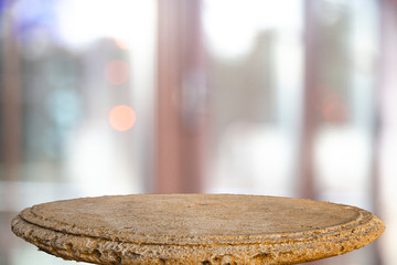 Empty wooden table top on blurred curtains overlooking office window, cafe, lady, green color with wood garden background. For mounting a product display (product) or visual design key.