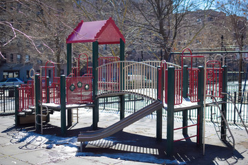 A lonley playground/jungle-gym on a sunny winter's day in Harlem, New York, NY, USA