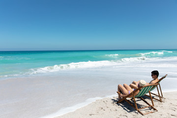 Young couple relaxing at the beach