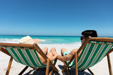 Young couple relaxing at the beach