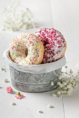 Colorful donuts with various types of toppings