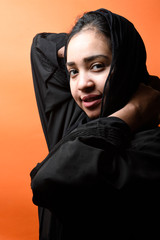 Fototapeta na wymiar Portrait of arabic woman with traditional abaya dress in a studio , Beauty Face,head and shoulder