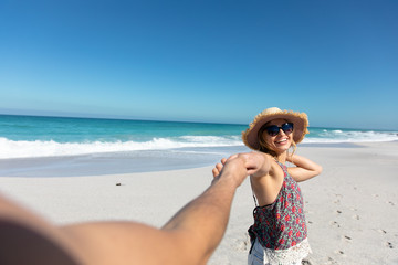 Young couple having fun at the beach