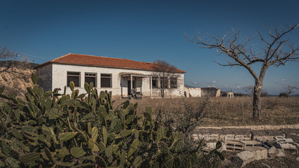 Fototapeta na wymiar old abandoned school building at Greece