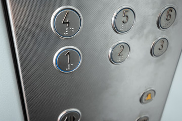 Buttons elevator panel close-up. Movement, transportation.