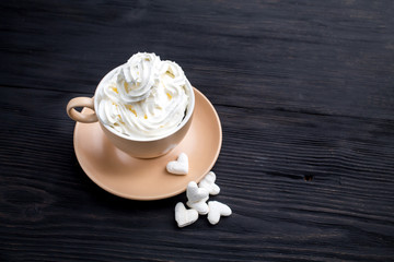 Obraz na płótnie Canvas Cup of coffee with decoration -marshmellow, cream, berries