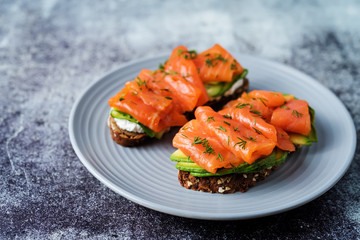 Smoked salmon ricotta cheese  rye sandwich