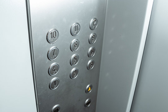 Buttons elevator panel close-up. Movement, transportation.