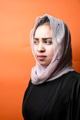 Portrait of arabic woman with traditional abaya dress with Serious expression