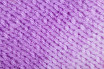 Knitted texture, woolen product, homework, hobbies, knitting, needlework.