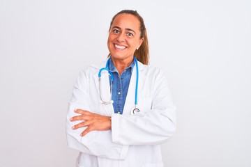 Fototapeta premium Middle age mature doctor woman wearing stethoscope over isolated background happy face smiling with crossed arms looking at the camera. Positive person.