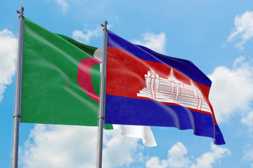 Cambodia and Algeria flags waving in the wind against white cloudy blue sky together. Diplomacy concept, international relations.