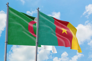 Cameroon and Algeria flags waving in the wind against white cloudy blue sky together. Diplomacy concept, international relations.