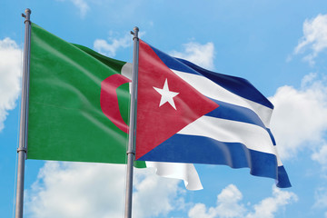 Cuba and Algeria flags waving in the wind against white cloudy blue sky together. Diplomacy concept, international relations.