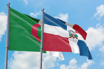 Dominican Republic and Algeria flags waving in the wind against white cloudy blue sky together. Diplomacy concept, international relations.