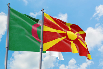 Macedonia and Algeria flags waving in the wind against white cloudy blue sky together. Diplomacy concept, international relations.