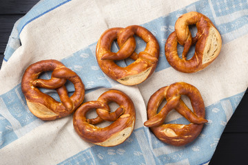 Delicious pretzel with salt, german food. Brezel, traditional bavarian food. Bavarian authentic pretzels for Oktoberfest. German Pretzel called Brezel – very popular Bread in Germany 