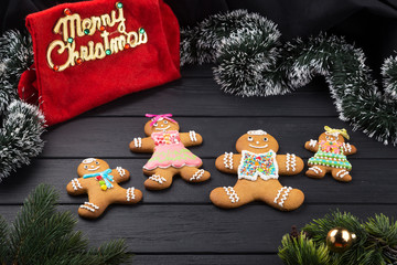 Gingerbread man, Christmas bakery, Gingerbread man decorated colored icing. Holiday cookie in shape of man. Gingerbread Christmas symbols, cookie.