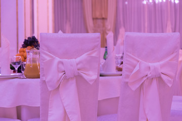 Romantic chair backs in pink tones. Concept. Lesbian relationships. Dating, love, relationships. LGBT PERSON.