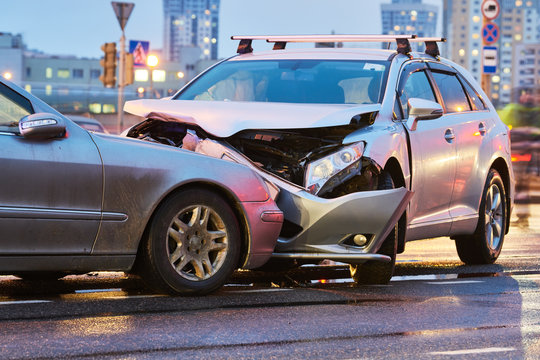 automobile crash accident on street. damaged cars