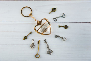 Decoration golden heart with jewelry stone and many different keys around it