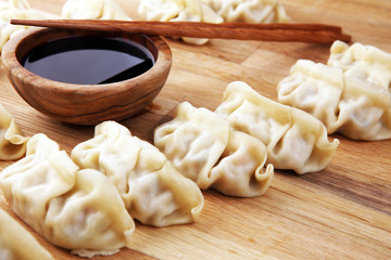 Gyoza or dumplings snack with soy sauce.
