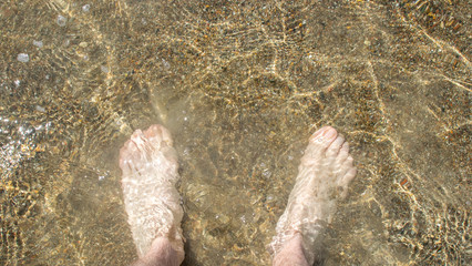 feet in the water