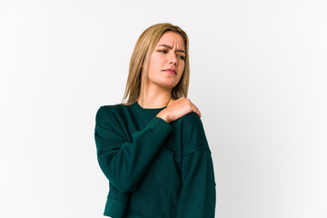 Young blonde caucasian woman isolated having a shoulder pain.