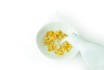 cereal with milk in a white plate for breakfast, space for text, isolate