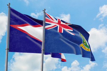 British Virgin Islands and American Samoa flags waving in the wind against white cloudy blue sky together. Diplomacy concept, international relations.