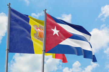 Cuba and Andorra flags waving in the wind against white cloudy blue sky together. Diplomacy concept, international relations.
