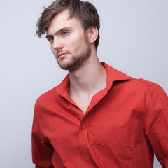 Handsome young elegant man studio portrait.