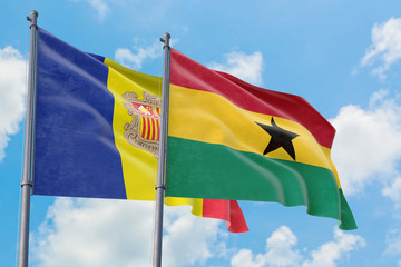Ghana and Andorra flags waving in the wind against white cloudy blue sky together. Diplomacy concept, international relations.