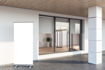 Facade apartment with window and blank poster on wall.