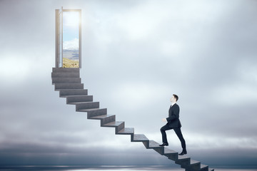 Businessman walking on ladder to success