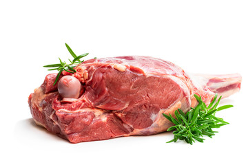 Fresh raw lamb leg with rosemary leaves isolated on white