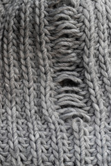 Light grey knitting texture with manufacturing defect
